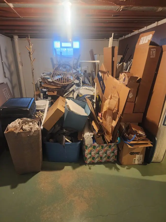 Roll-off dumpster container at job site for 2 Yard Dumpster Rental in Coos Bay